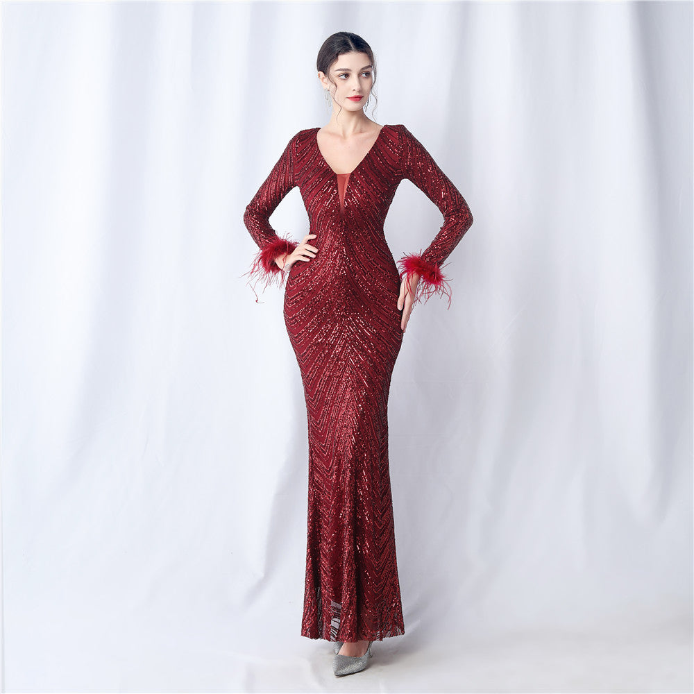 Robe de soirée Amirah à plumes et sequins