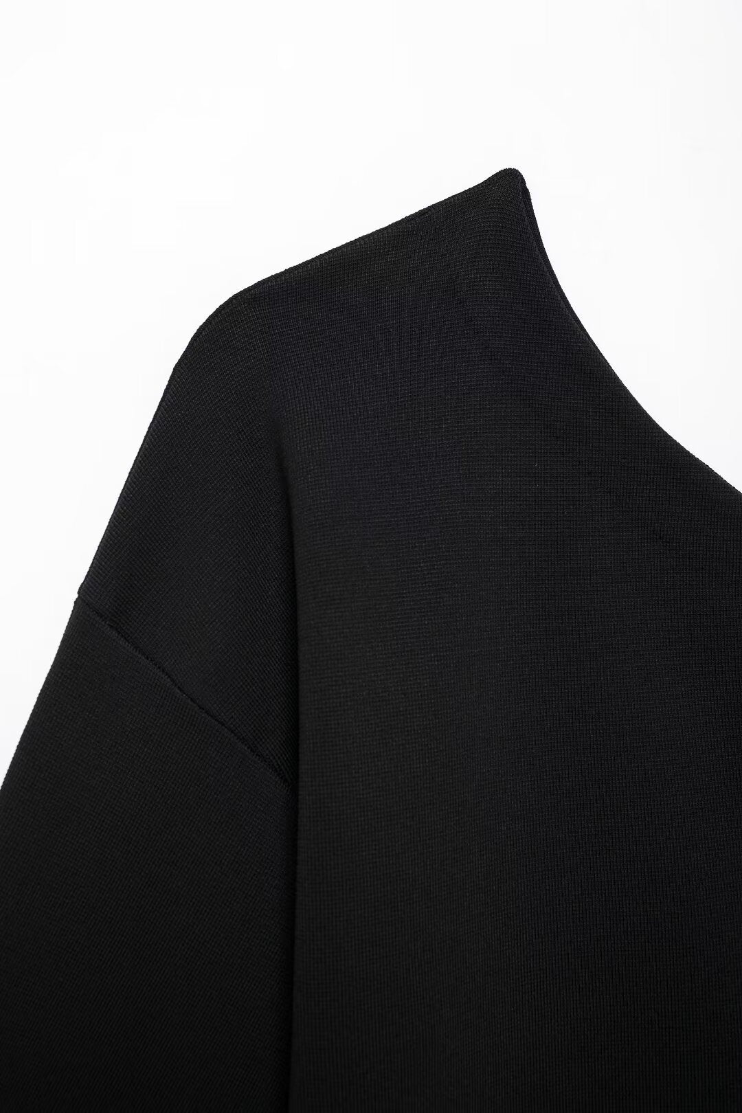 Liora Asymmetric Knit Top