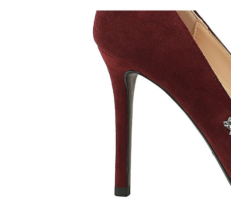 Taye Rhinestone Suede Pumps