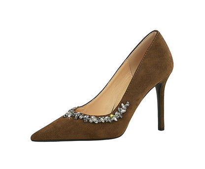 Taye Rhinestone Suede Pumps
