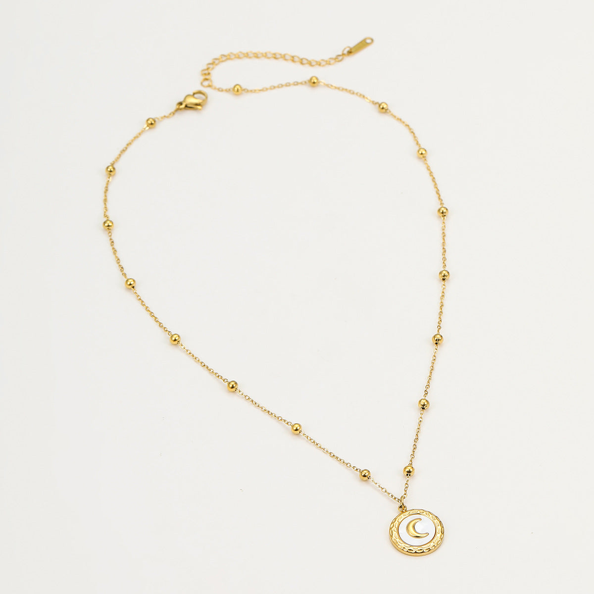 Ensemble collier et boucles d'oreilles en lune Nyali 