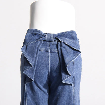 Jean slim taille haute Nalira à nœud papillon